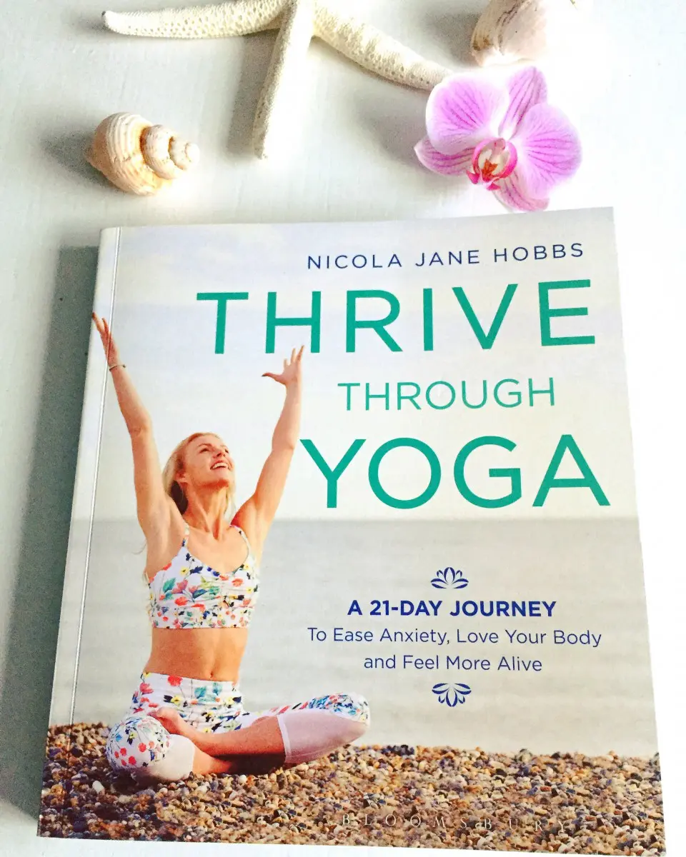 Thrive Through Yoga book Thrive Through Yoga by Nicola Jane Hobbs