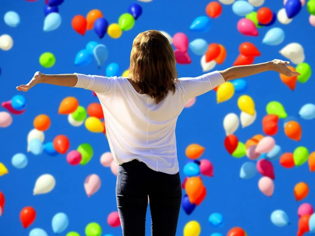 happy girl with balloons