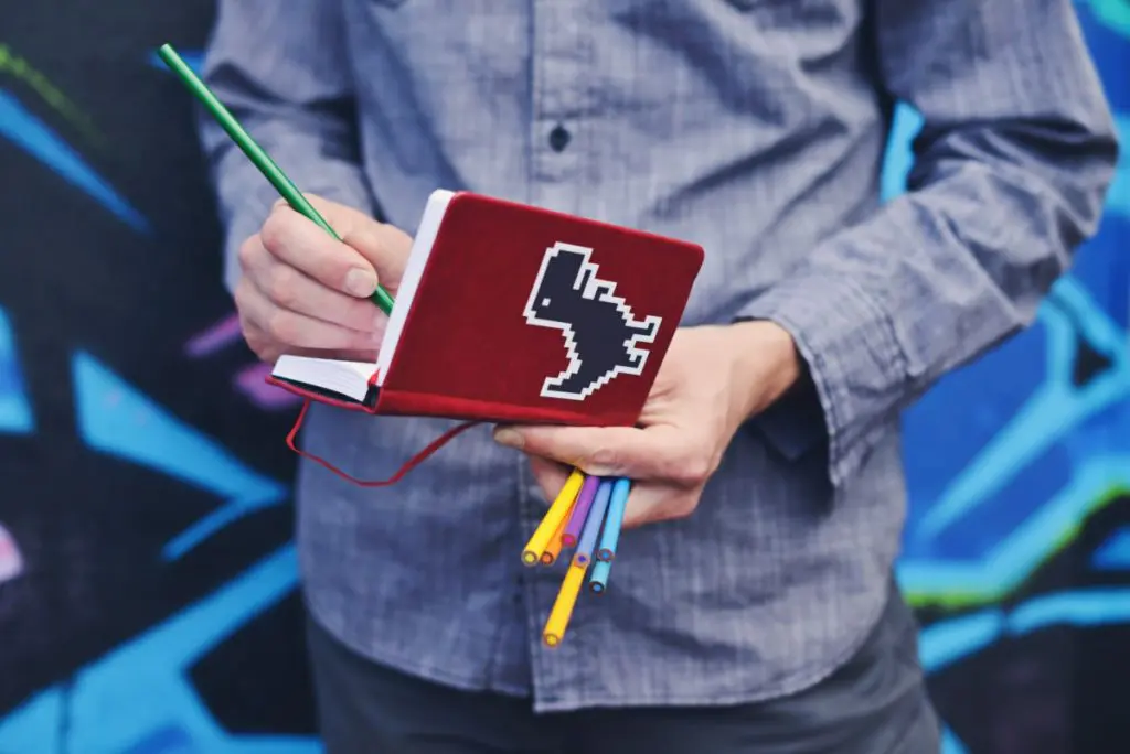 creative notebook pencil