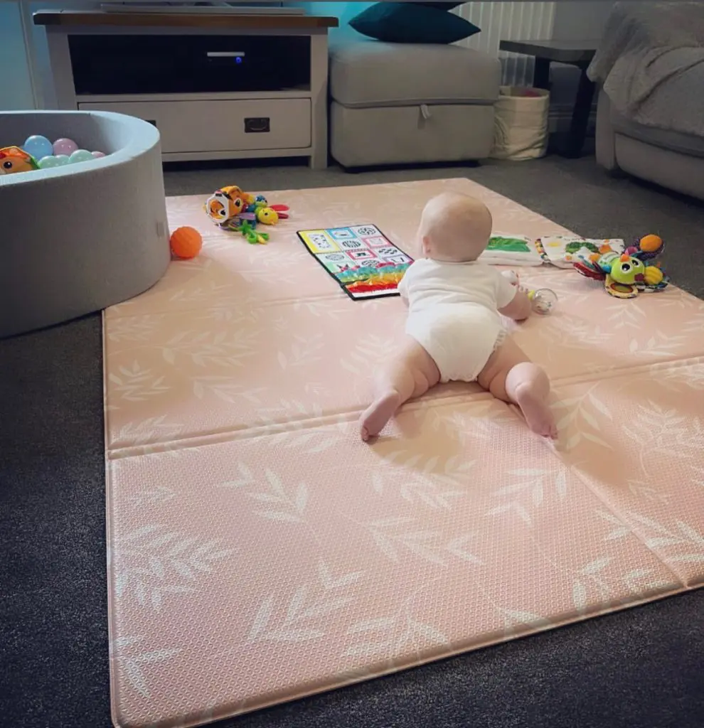 baby laying on foldimats