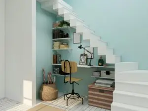 hallway in home with desk and stairs