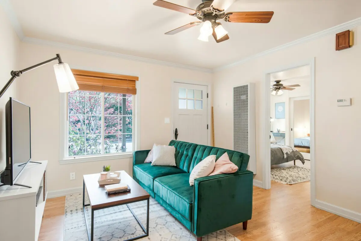 living room with fan and couch
