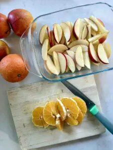 sliced apples and oranges