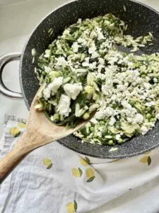 orzo salad in wooden spoon orzo salad in wooden spoon