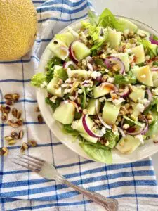 Galia melon salad with feta and pistachio served Galia melon salad with feta and pistachio served