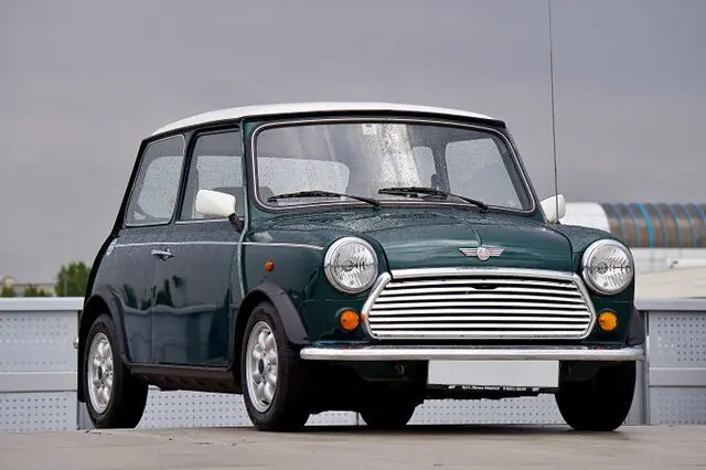 Small Mini Cooper parked on the road Small Mini Cooper parked on the road