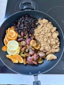 plum conserve ingredients in pan